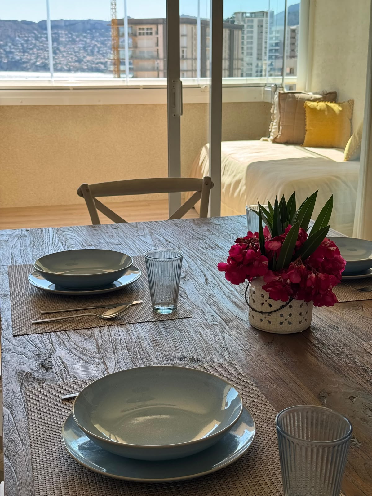 Close-up of table setting with flowers